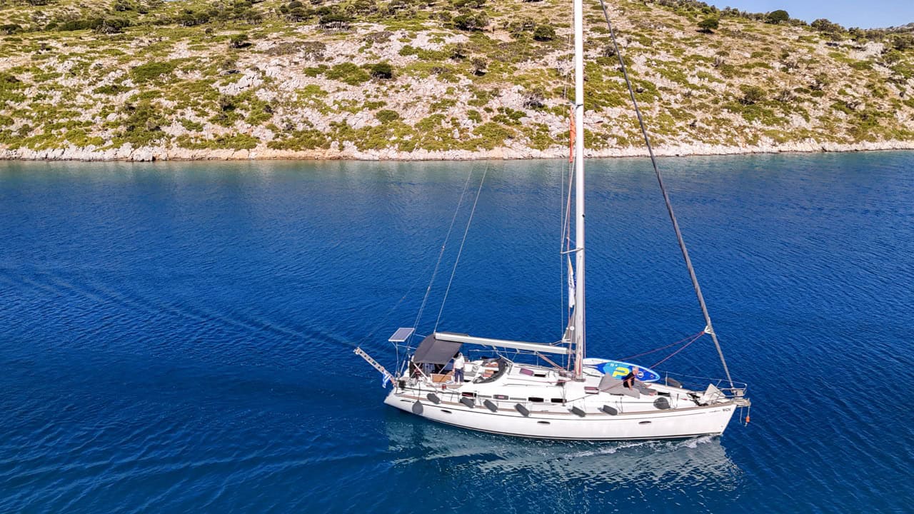 Sailing yacht Halkidiki — classic sailing yacht cruising the Halkidiki coastline on a clear day